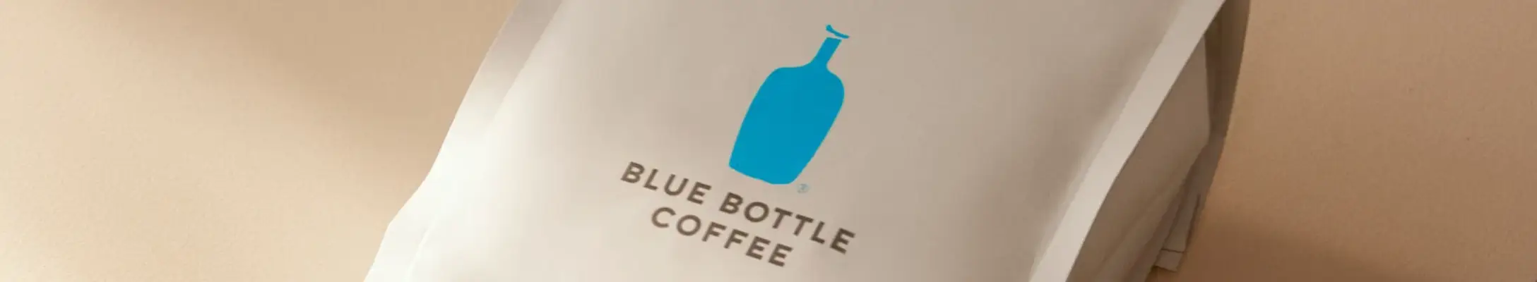Blue bottle coffee logo on a coffee bag