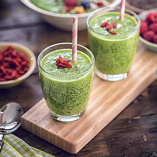 Green smoothie with raspberries in them