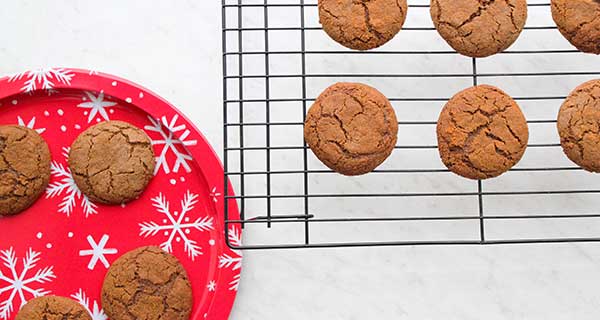 paleo molasses cookies on a cooling rack