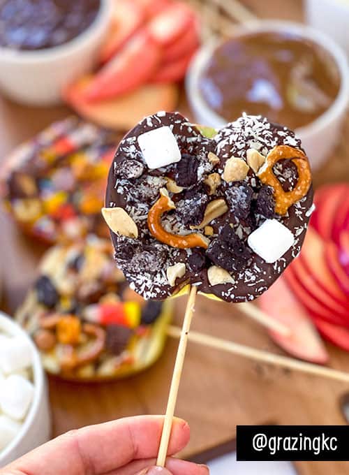 chocolate dipped apple slice with candy